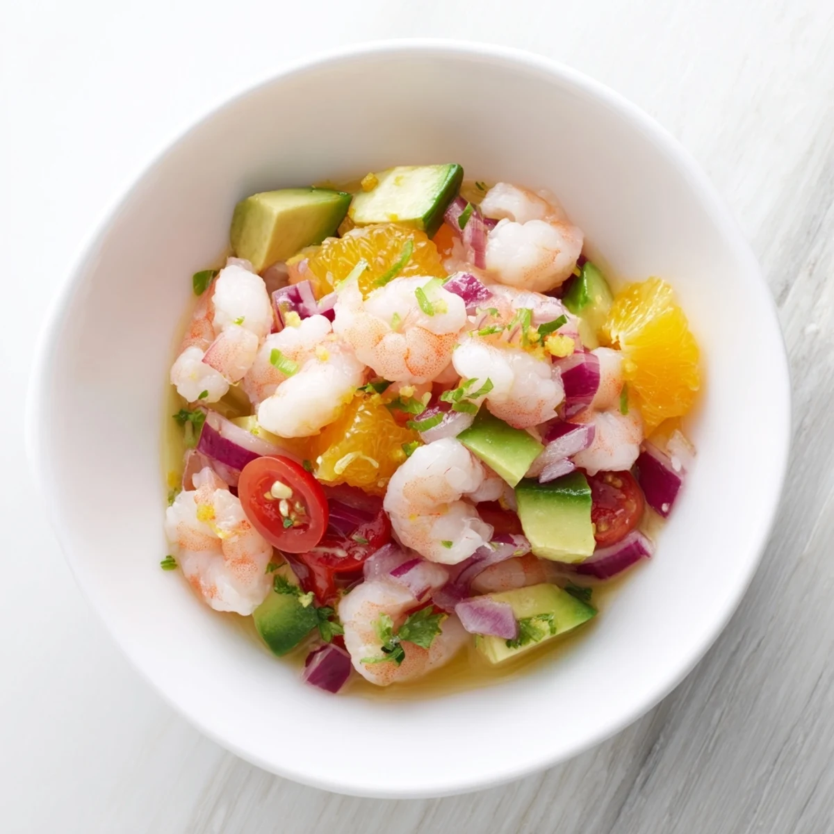A colorful bowl of Light & Fresh Shrimp Ceviche with plump shrimp and bright citrus.