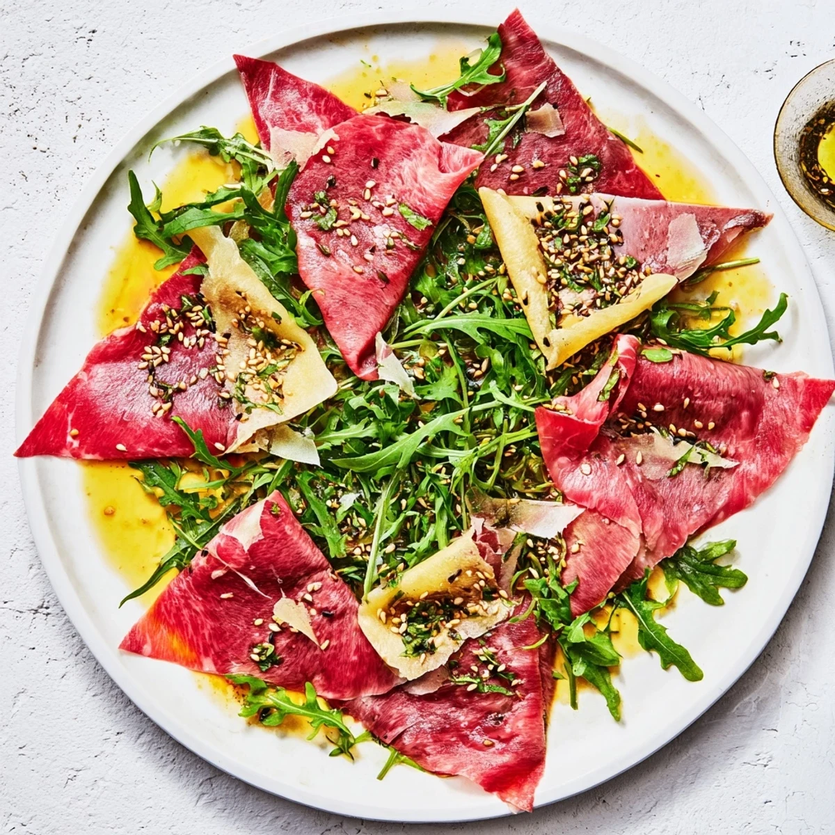 Delicate Origami Fold Beef Appetizer, featuring sesame seeds and chives, makes a flavorful and beautiful dish.