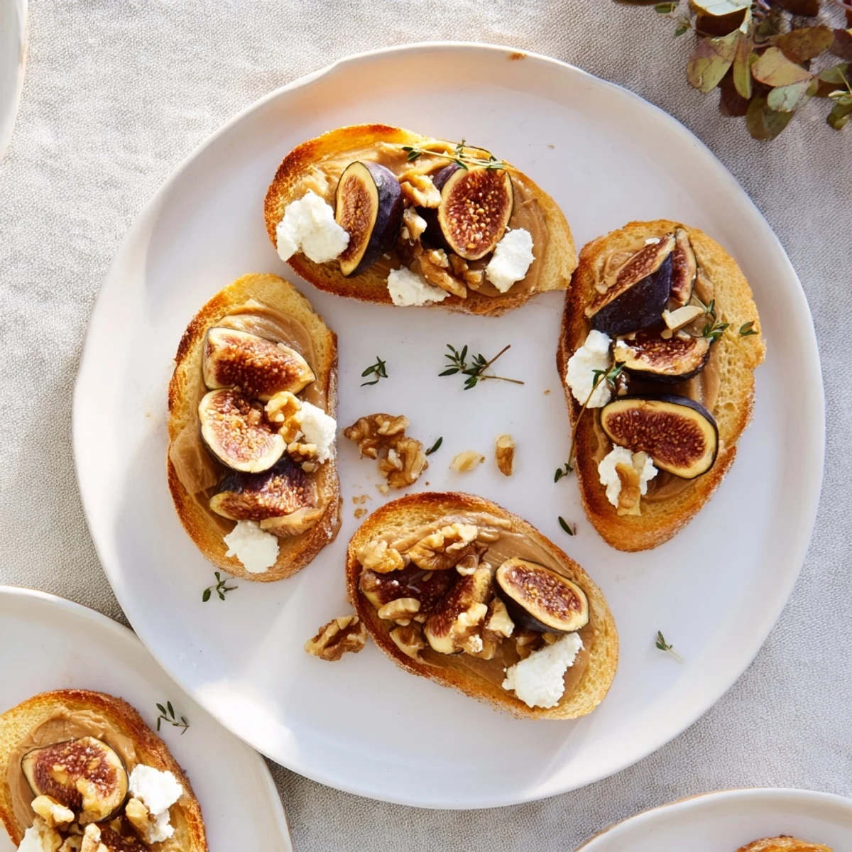 Beautifully prepared Royal Tapestry: Rich pâté, fruity figs, and goat cheese on golden brioche for elegant entertaining.