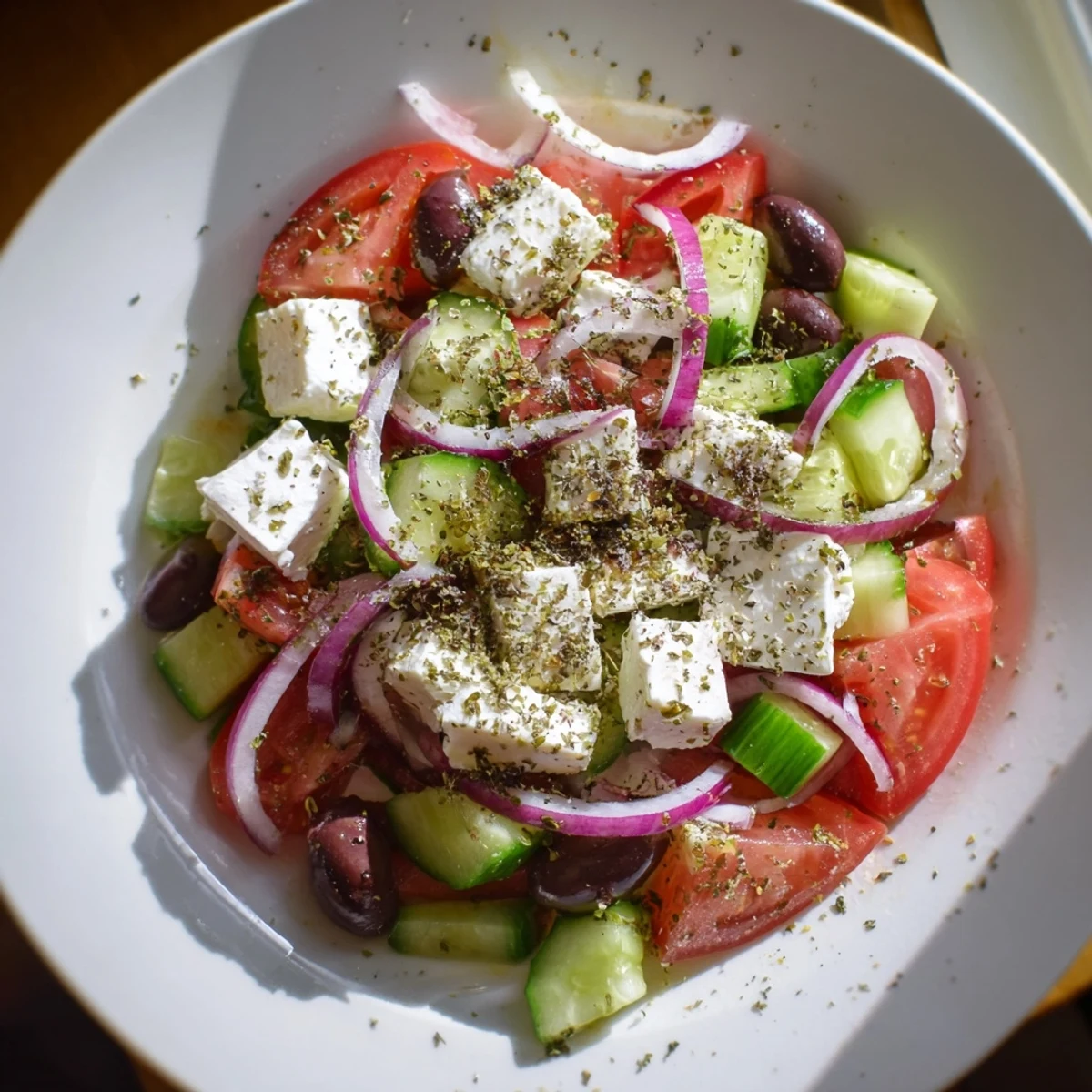 A bright and colorful Mediterranean Salad, ready to enjoy—featuring a medley of fresh vegetables.