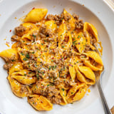 One pot creamy beef and shells cooked to perfection, garnished with fresh parsley and ready for a comforting weeknight family dinner.  