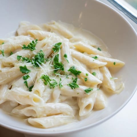 Creamy Milk Pasta One-Pot simmered in a skillet with garlic, butter, and Parmesan until glossy and velvety.  